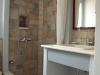 elegantly-tiled-bathroom-next-to-the-kitchen
